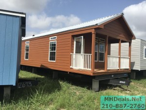 2 bedroom 1 bath cedar sided porch cabin exterior